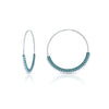 Lightweight and timeless, these sterling silver endless hoops are wrapped in color with tiny silk knots and glass beads. Intricate details, simplistic in shape.  Edit alt text