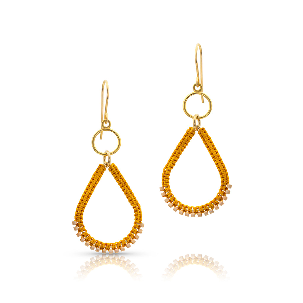 Gold filled components and a stylishly shaped teardrop enhanced with bead silk knotting create a beautiful combination of texture.